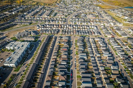 Stunning bird's-eye perspective of the Evergreen neighborhood in Saskatoon, showcasing the unique urban layout and the natural beauty of Saskatchewan's landscapes.