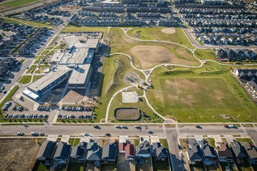 Stunning bird's-eye perspective of the Evergreen neighborhood in Saskatoon, showcasing the unique urban layout and the natural beauty of Saskatchewan's landscapes.