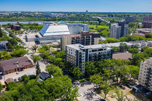 Discover the vibrant City Park neighborhood in Saskatoon from above. This drone image captures its lush green spaces, historic charm, and lively urban atmosphere, offering a unique aerial perspective.