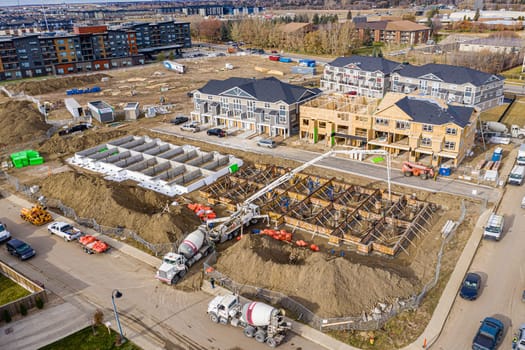Aerial view of Stonebridge, Saskatoon, SK, Canada. The image highlights the modern urban layout, residential areas, and connecting roads. Ideal for cityscapes.