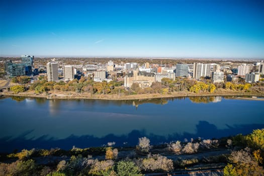 Aerial spectacle of downtown Saskatoon, revealing the city's architectural marvels, bustling streets, and the pulsating core of Saskatchewan's metropolis