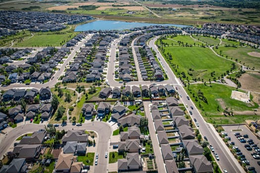 Captivating aerial shot of Stonebridge in Saskatoon, highlighting the harmonious blend of modern architecture and Saskatchewan's verdant surroundings.