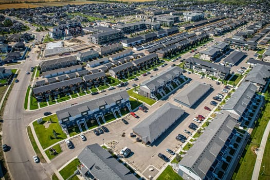 Stunning bird's-eye perspective of the Evergreen neighborhood in Saskatoon, showcasing the unique urban layout and the natural beauty of Saskatchewan's landscapes.