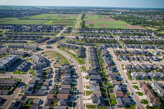 Stunning bird's-eye perspective of the Evergreen neighborhood in Saskatoon, showcasing the unique urban layout and the natural beauty of Saskatchewan's landscapes.