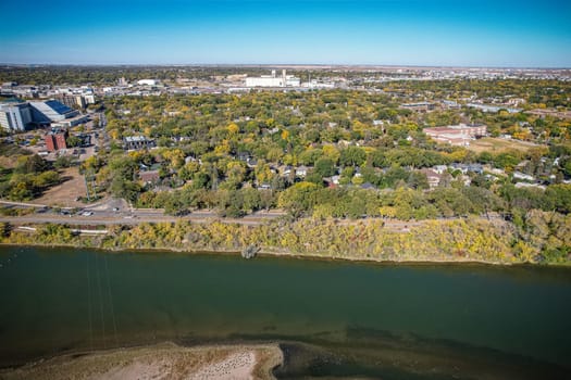 Aerial view of City Park which is a mixed-use neighbourhood located near the center of Saskatoon, Saskatchewan, Canada. It comprises a mix of single-family detached homes, apartment buildings and other semi-detached dwellings