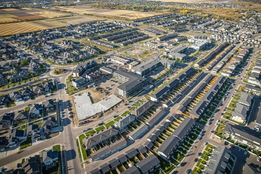 Stunning bird's-eye perspective of the Evergreen neighborhood in Saskatoon, showcasing the unique urban layout and the natural beauty of Saskatchewan's landscapes.