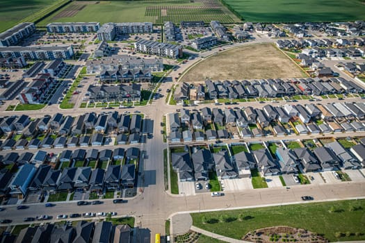Stunning bird's-eye perspective of the Evergreen neighborhood in Saskatoon, showcasing the unique urban layout and the natural beauty of Saskatchewan's landscapes.