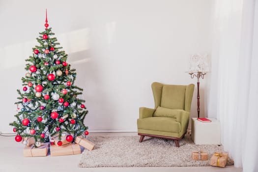 rozhestvenskaja tree in a white room on new year's Eve