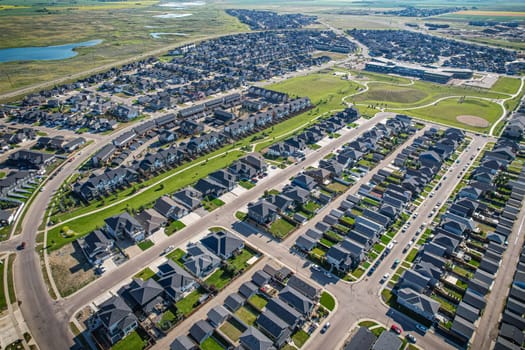 Stunning bird's-eye perspective of the Evergreen neighborhood in Saskatoon, showcasing the unique urban layout and the natural beauty of Saskatchewan's landscapes.