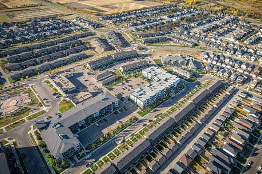Stunning bird's-eye perspective of the Evergreen neighborhood in Saskatoon, showcasing the unique urban layout and the natural beauty of Saskatchewan's landscapes.