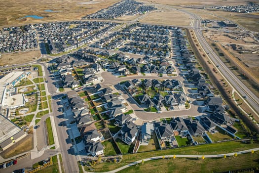 Stunning bird's-eye perspective of the Evergreen neighborhood in Saskatoon, showcasing the unique urban layout and the natural beauty of Saskatchewan's landscapes.