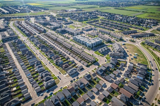 Stunning bird's-eye perspective of the Evergreen neighborhood in Saskatoon, showcasing the unique urban layout and the natural beauty of Saskatchewan's landscapes.