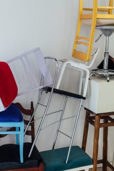 lots of multicolored chairs in the interior of the room