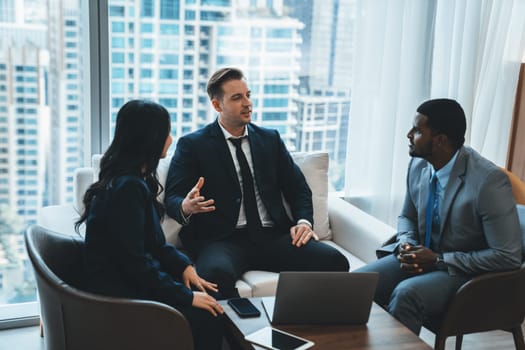 Group of diverse executive investor listening businessman talking about investment. Professional business team discussing about business plan, statistic, marketing strategy at office. Ornamented.