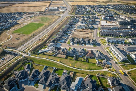 Stunning bird's-eye perspective of the Evergreen neighborhood in Saskatoon, showcasing the unique urban layout and the natural beauty of Saskatchewan's landscapes.