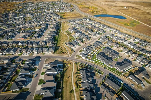 Stunning bird's-eye perspective of the Evergreen neighborhood in Saskatoon, showcasing the unique urban layout and the natural beauty of Saskatchewan's landscapes.