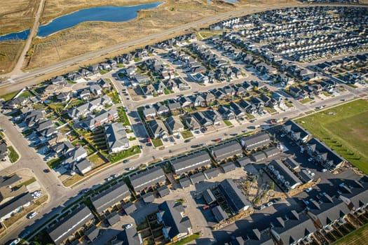 Stunning bird's-eye perspective of the Evergreen neighborhood in Saskatoon, showcasing the unique urban layout and the natural beauty of Saskatchewan's landscapes.