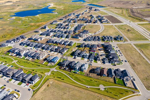 Discover the stunning Aspen Ridge in Saskatoon through this captivating aerial view. Captured by drone, this image showcases the unique urban landscape, serene parks, and vibrant community life. Experience the beauty of Saskatchewan from a breathtaking new perspective.
