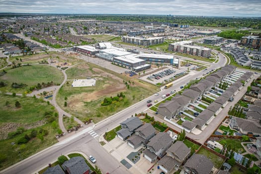 Captivating aerial shot of Stonebridge in Saskatoon, highlighting the harmonious blend of modern architecture and Saskatchewan's verdant surroundings.