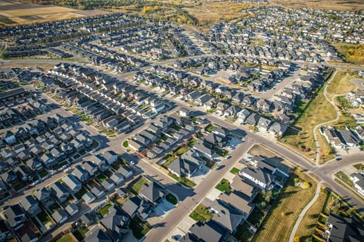 Stunning bird's-eye perspective of the Evergreen neighborhood in Saskatoon, showcasing the unique urban layout and the natural beauty of Saskatchewan's landscapes.