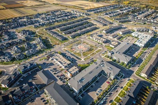 Stunning bird's-eye perspective of the Evergreen neighborhood in Saskatoon, showcasing the unique urban layout and the natural beauty of Saskatchewan's landscapes.