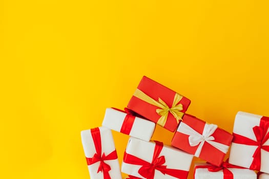 Christmas presents on a yellow background