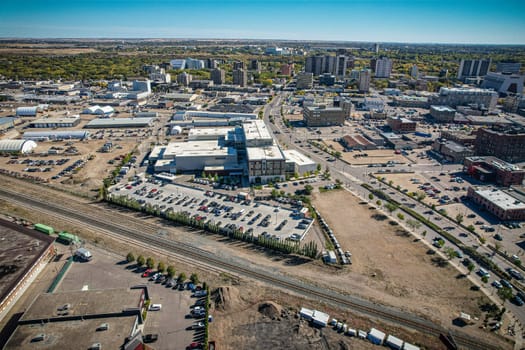 Aerial spectacle of downtown Saskatoon, revealing the city's architectural marvels, bustling streets, and the pulsating core of Saskatchewan's metropolis