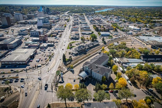 Aerial spectacle of downtown Saskatoon, revealing the city's architectural marvels, bustling streets, and the pulsating core of Saskatchewan's metropolis
