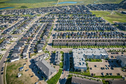 Stunning bird's-eye perspective of the Evergreen neighborhood in Saskatoon, showcasing the unique urban layout and the natural beauty of Saskatchewan's landscapes.