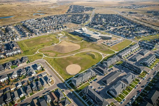Stunning bird's-eye perspective of the Evergreen neighborhood in Saskatoon, showcasing the unique urban layout and the natural beauty of Saskatchewan's landscapes.