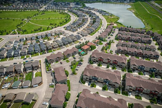 Captivating aerial shot of Stonebridge in Saskatoon, highlighting the harmonious blend of modern architecture and Saskatchewan's verdant surroundings.