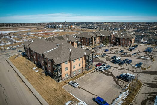 Captivating aerial shot of Stonebridge in Saskatoon, highlighting the harmonious blend of modern architecture and Saskatchewan's verdant surroundings.