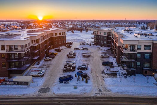 Fly over The Willows in Saskatoon, where the allure of upscale living meets the tranquility of golf course greens. This image captures the well-manicured landscapes and exclusive residences.
