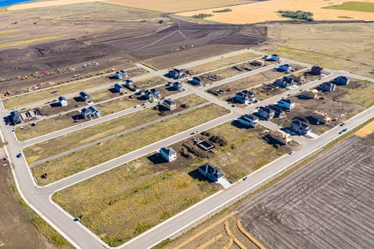 Discover the stunning Aspen Ridge in Saskatoon through this captivating aerial view. Captured by drone, this image showcases the unique urban landscape, serene parks, and vibrant community life. Experience the beauty of Saskatchewan from a breathtaking new perspective.