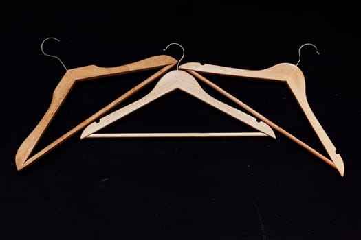 many hangers for clothes on background