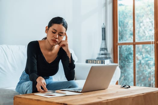 Stressed young woman has financial problems with credit card debt to pay uttermost show concept of bad personal money and mortgage pay management crisis.