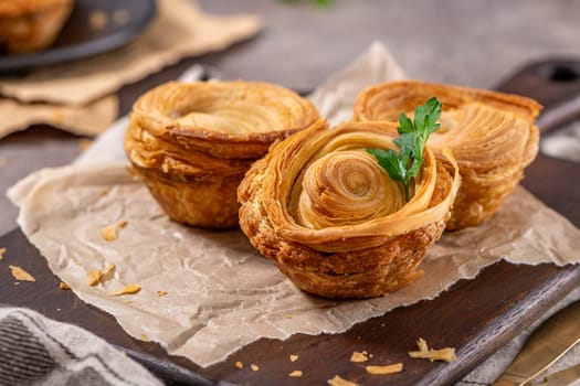 Pastries filled with meat, traditionally baked in black clay molds both from the region on Vila Real, Portugal.