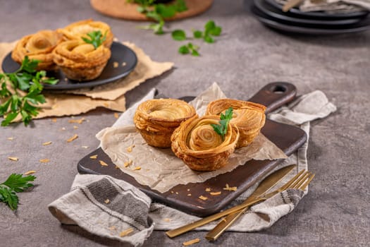 Pastries filled with meat, traditionally baked in black clay molds both from the region on Vila Real, Portugal.