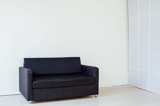 black sofa in the interior of the room