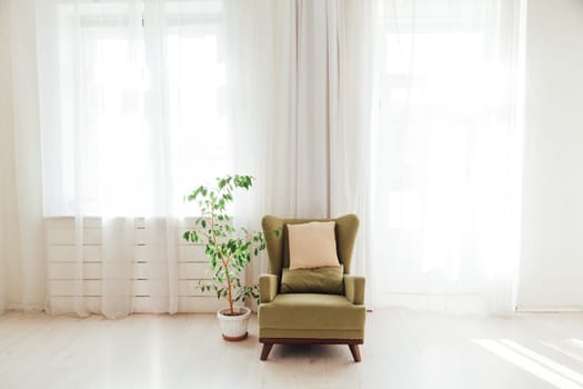green vintage chair in the interior of the room