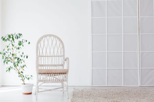 white chair in the interior of the white room