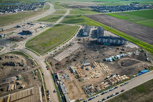 Stunning bird's-eye perspective of the Evergreen neighborhood in Saskatoon, showcasing the unique urban layout and the natural beauty of Saskatchewan's landscapes.