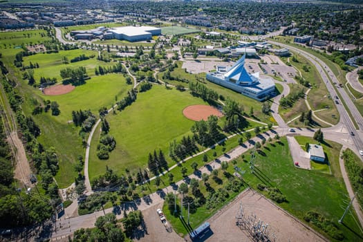 Aerial journey over Silverspring in Saskatoon, revealing a harmonious blend of suburban life, green expanses, and the distinct charm of Saskatchewan's landscapes.