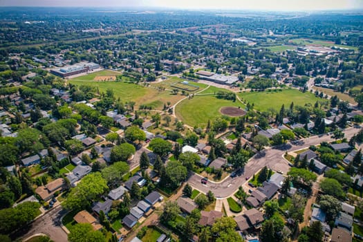 Aerial view of Brevoort Park which is a primarily residential neighbourhood located in the southeast part of Saskatoon, Saskatchewan, Canada. It includes part of the 8th Street business district. Just over half of its dwellings are single detached houses, with a sizeable minority of duplex or apartment-style multiple unit dwellings