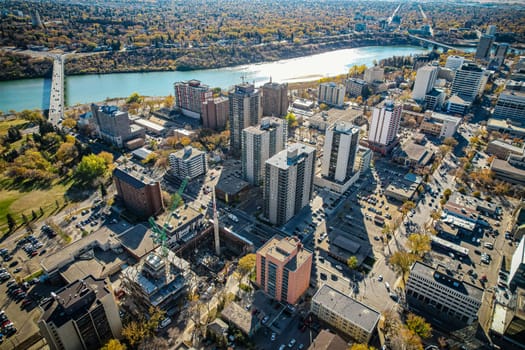 Aerial spectacle of downtown Saskatoon, revealing the city's architectural marvels, bustling streets, and the pulsating core of Saskatchewan's metropolis