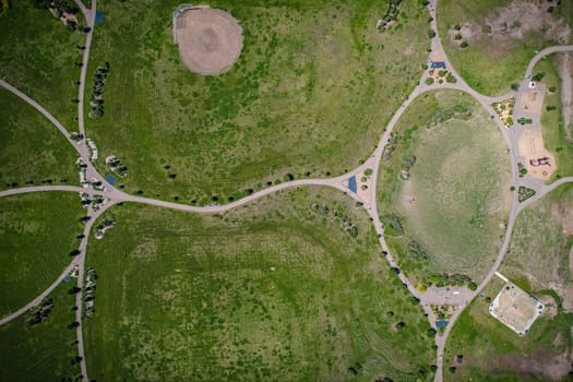 Captivating aerial shot of Stonebridge in Saskatoon, highlighting the harmonious blend of modern architecture and Saskatchewan's verdant surroundings.