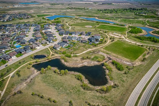 Aerial view of Briarwood which is a residential neighbourhood located in the southeast part of Saskatoon, Saskatchewan, Canada. The majority of its residents live in low-density, single detached dwellings.