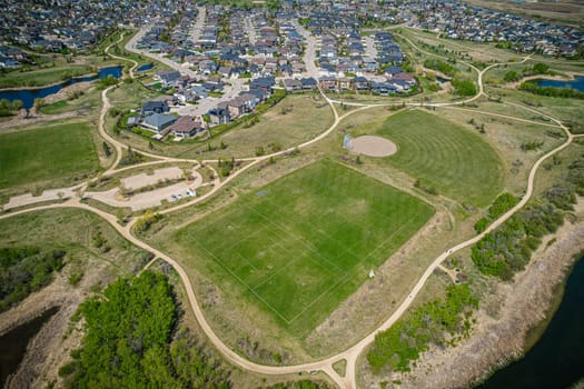 Aerial view of Briarwood which is a residential neighbourhood located in the southeast part of Saskatoon, Saskatchewan, Canada. The majority of its residents live in low-density, single detached dwellings.