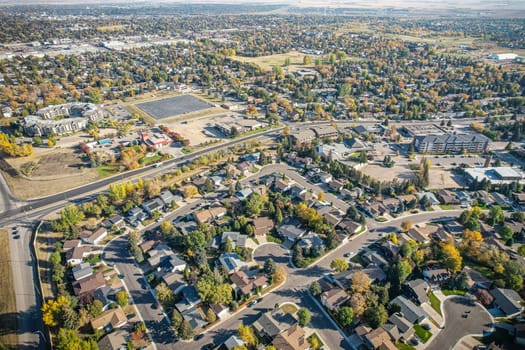 Soaring over Lakeview in Saskatoon, this bird's-eye capture magnifies the neighborhood's tranquil waters, verdant parks, and the serene rhythm of Saskatchewan living