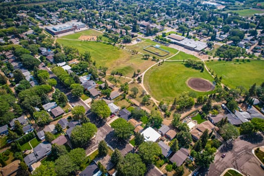 Aerial view of Brevoort Park which is a primarily residential neighbourhood located in the southeast part of Saskatoon, Saskatchewan, Canada. It includes part of the 8th Street business district. Just over half of its dwellings are single detached houses, with a sizeable minority of duplex or apartment-style multiple unit dwellings